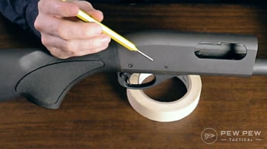 You'll want a punch to remove the two pins