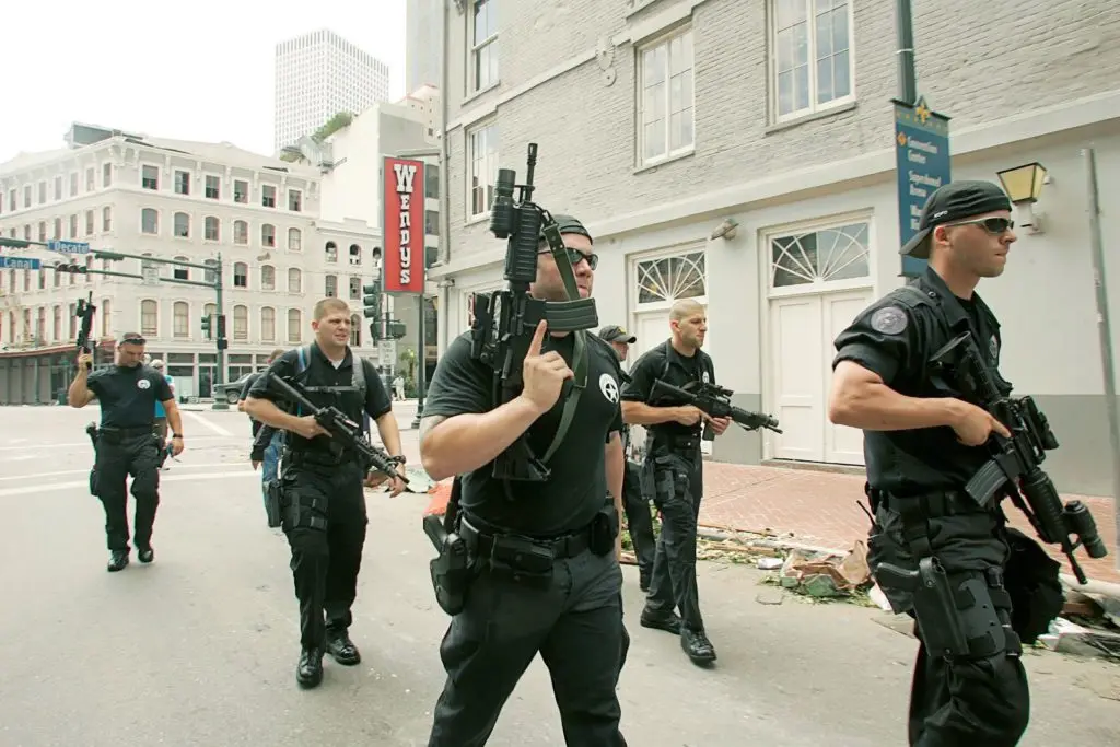 A local SWAT unit patrols the streets of New Orleans in the wake of Hurricane Katrina