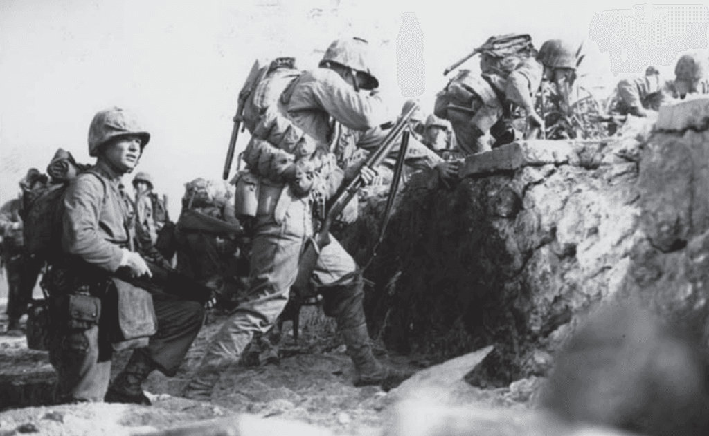 Marine-with-shotgun-on-Okinawa-beach