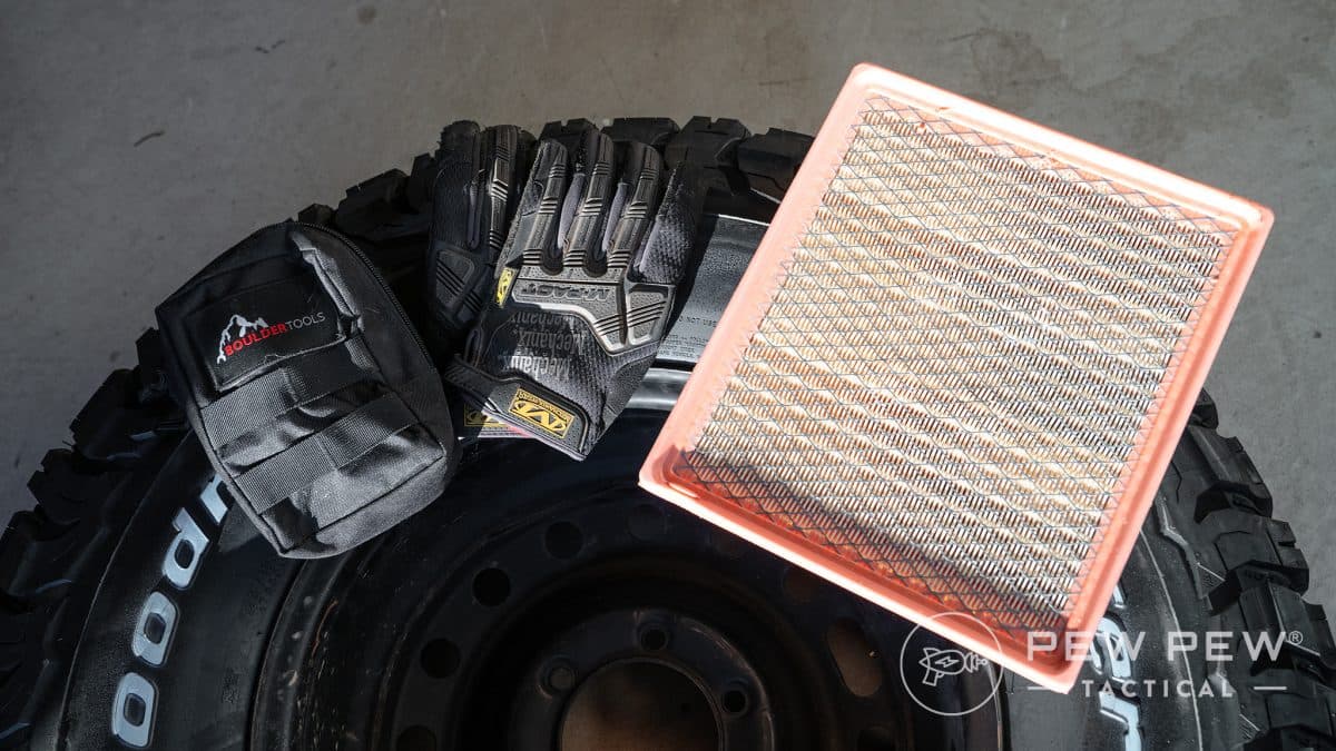 Spare tire, tire repair kit, gloves, and air filter