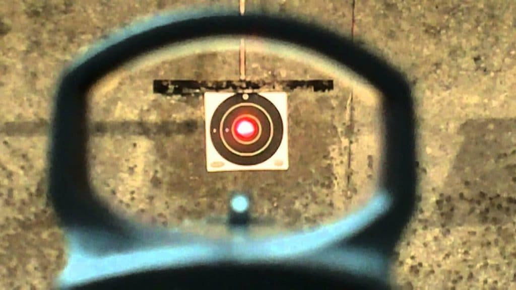red dot sight aiming at bullseye