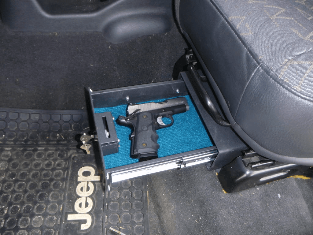 handgun in safe under drivers seat in jeep