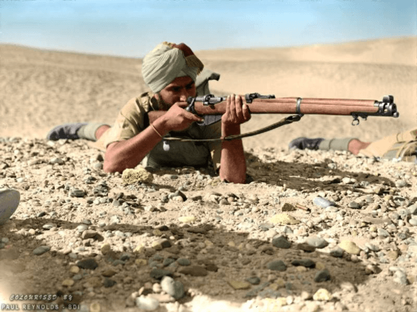 A Colourised Shot of an Indian Rifleman Shooting a Lee-Enfield Rifle During World War II