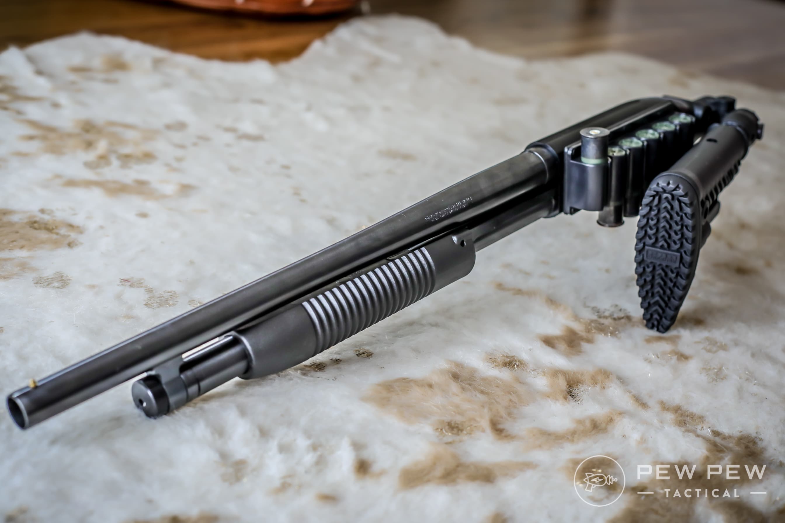 Maverick 88 with Folded FAB Defense Stock