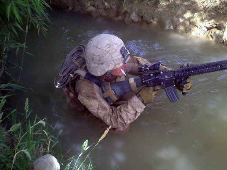 A Fellow Squad Member with an M16A4 and an ACOG