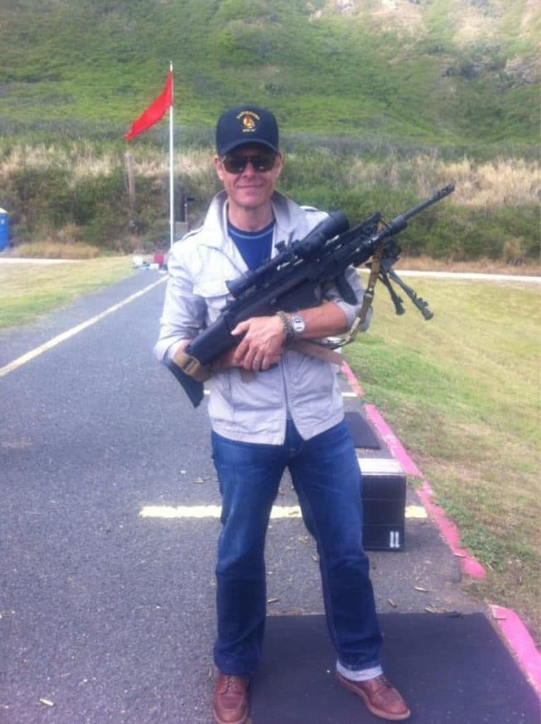 Alton Brown w/ gun