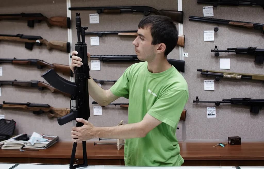 Seller-checking-Saiga-rifle-at-Russian-factory