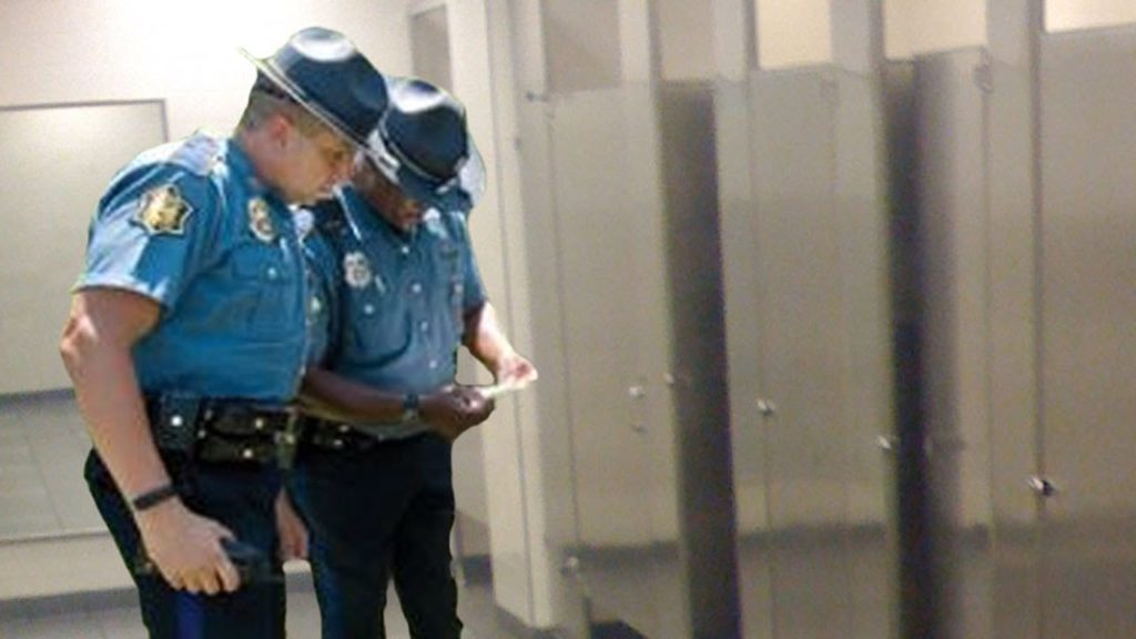 Police in Restroom
