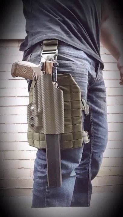 Osprey attached to holstered handgun