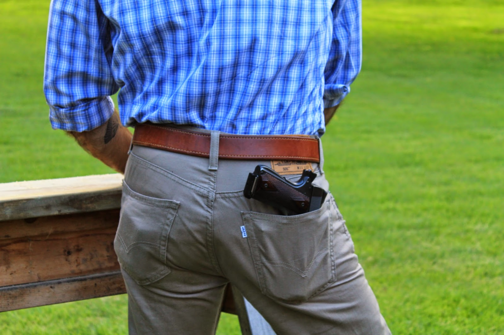 Carrying handgun in back pocket