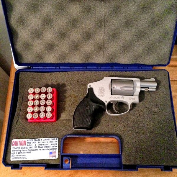 revolver and ammo packed in case
