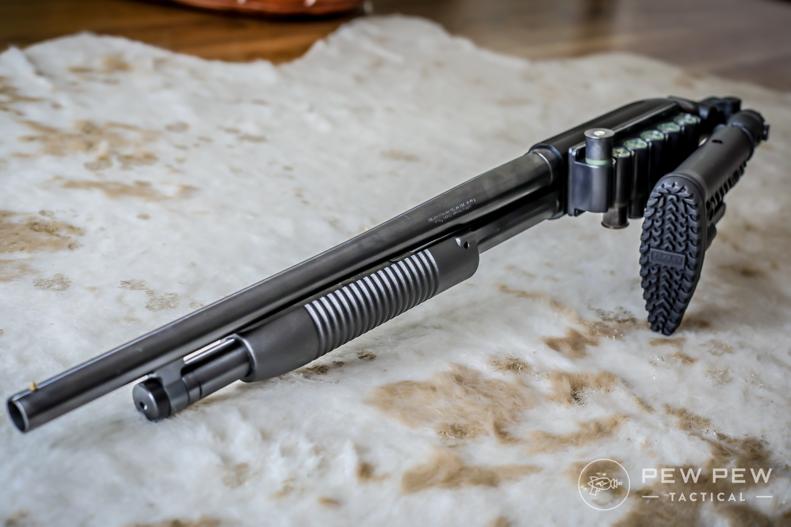 Maverick 88 with Folded FAB Defense Stock