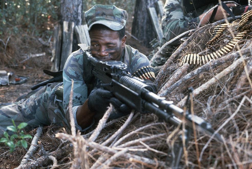 Marine in prone position without shooting mat