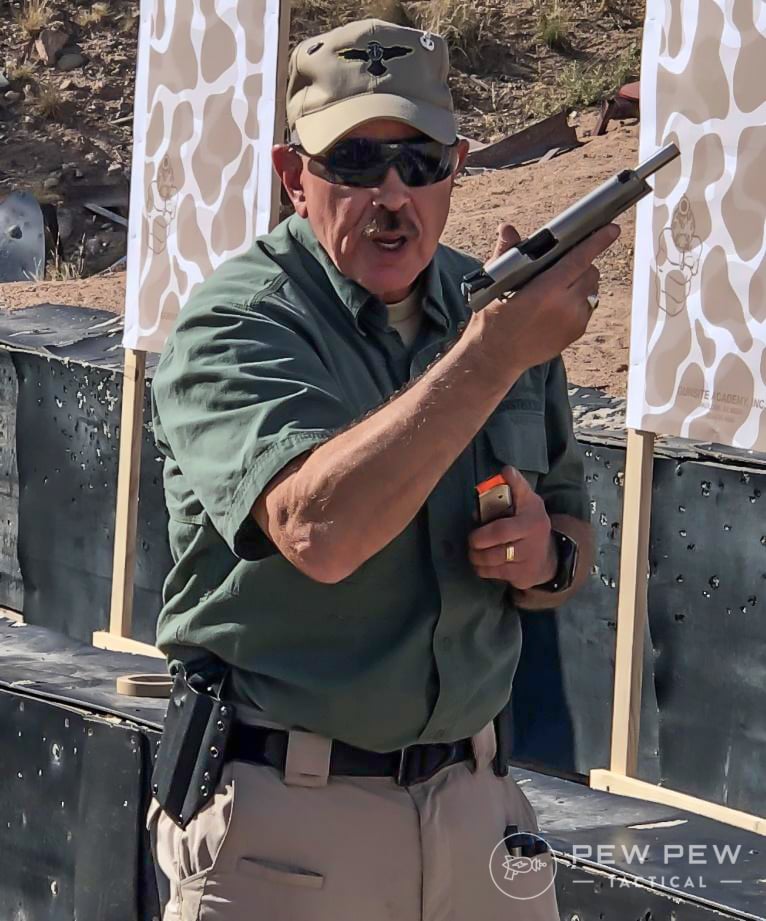 Gunsite is a fighting school, not just a shooting school. Â Here Randy demonstrated reloading in your workspace so you can stay aware of threats (no head down).