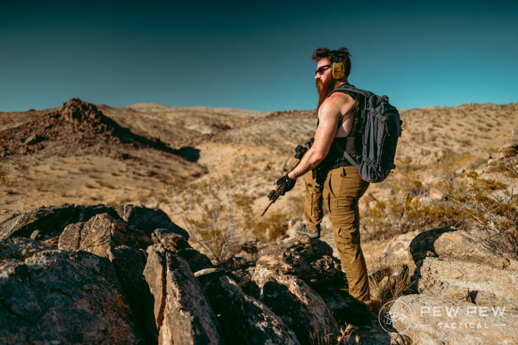 Bearded Man Overlooking Vista in Desert