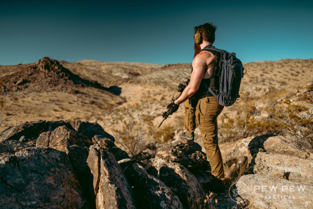 Bearded Man Overlooking Vista in Desert