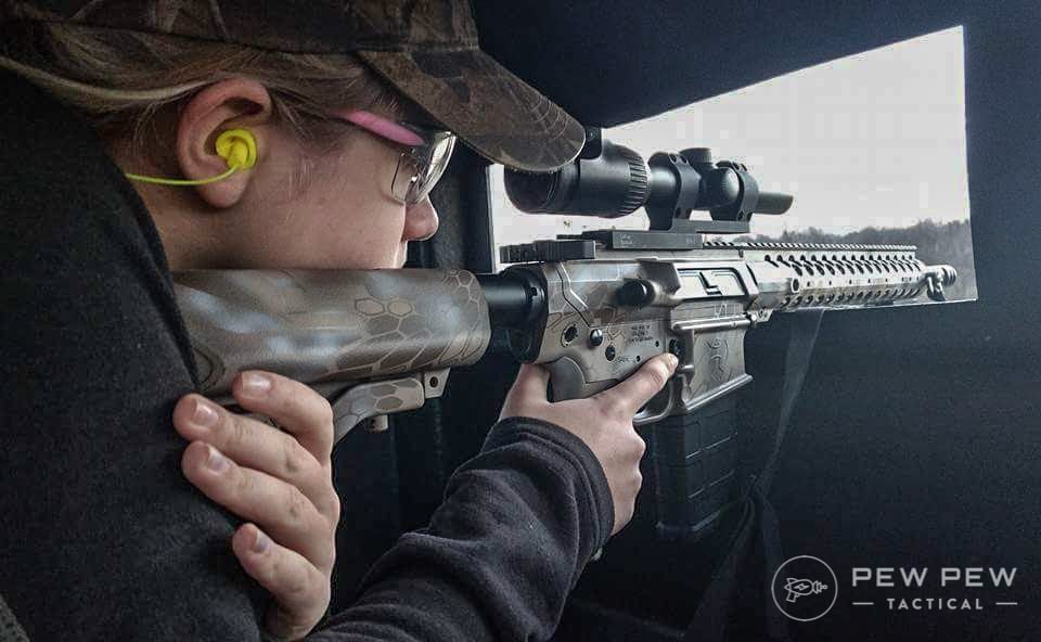 Grace running an AR-10 in .308 Win on a deer hunt at the age of twelve.