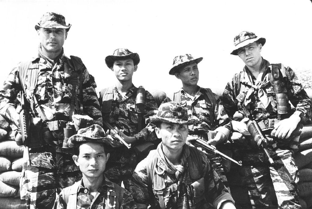 At center, South Vietnamese commandos with M-1 carbines. The U.S. Special Forces on both sides carry M-16s. Photo via Wikipedia