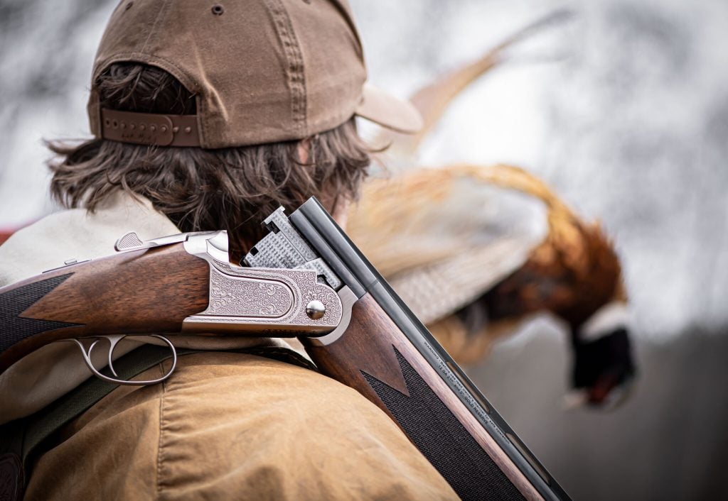 Mossberg Gold Reserve Over Shoulder