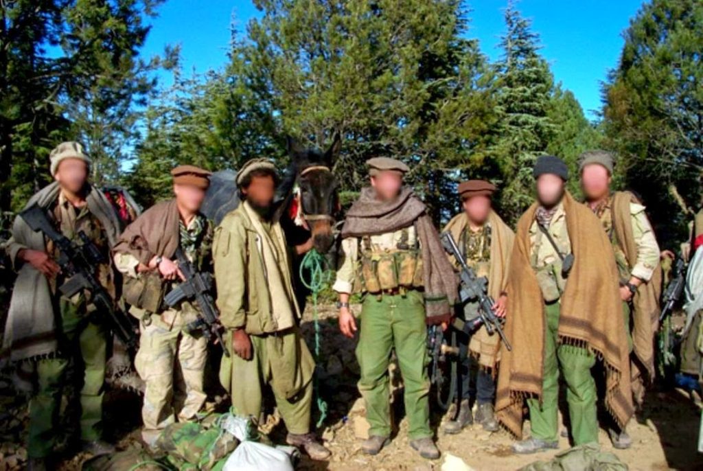 Delta force GIs disguised as Afghan civilians, November 2001