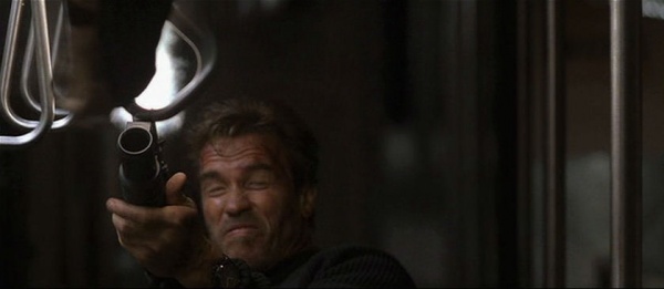 Jericho firing the MP5 at Satan