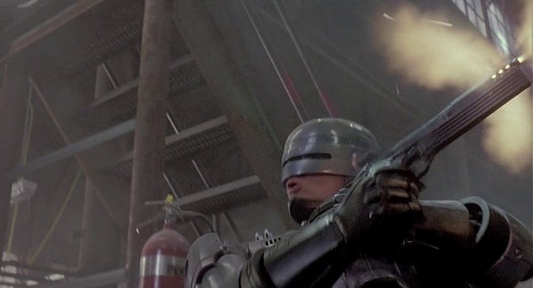 RoboCop fires his Auto 9 without visual aiming