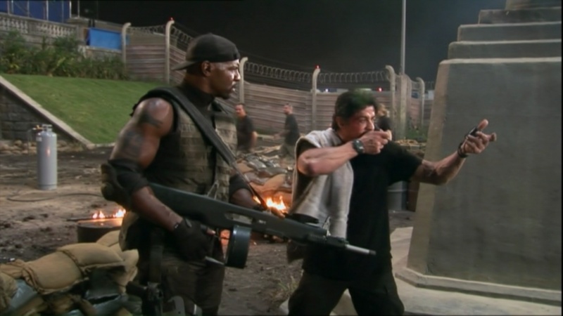 Stallone directing Crews behind the scenes of The Expendables