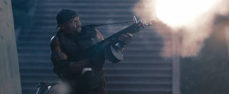 Terry Crews as Hale Caesar with his AA-12 in The Expendables