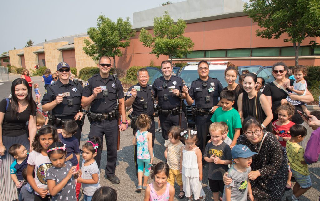 San Jose Police with children for story time