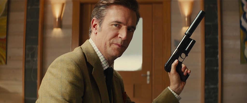 Lancelot (Jack Davenport) with a suppressed Kingsman pistol