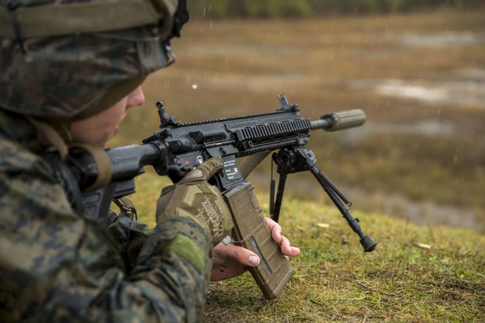 Marine fires the M27 (Photo Cpl. Michaela Gregory)