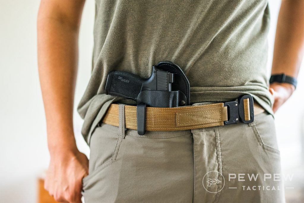 Conceal carry. In a form fitted tucked shirt. Yes it's possible. Full frame  / grip pistol. : r/CCW