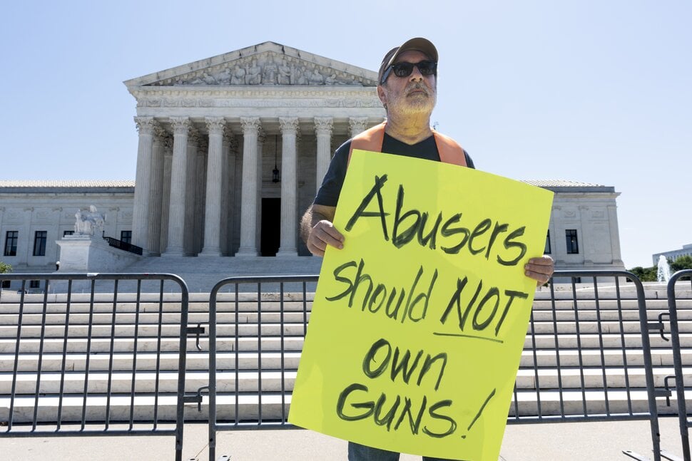 Supreme Court protestor during US v. Rahimi