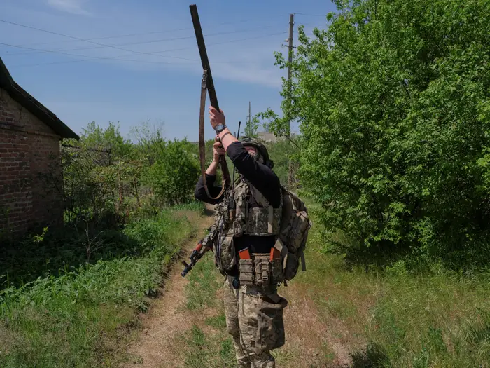 Ukrainian soldier using shotgun to shoot down drones
